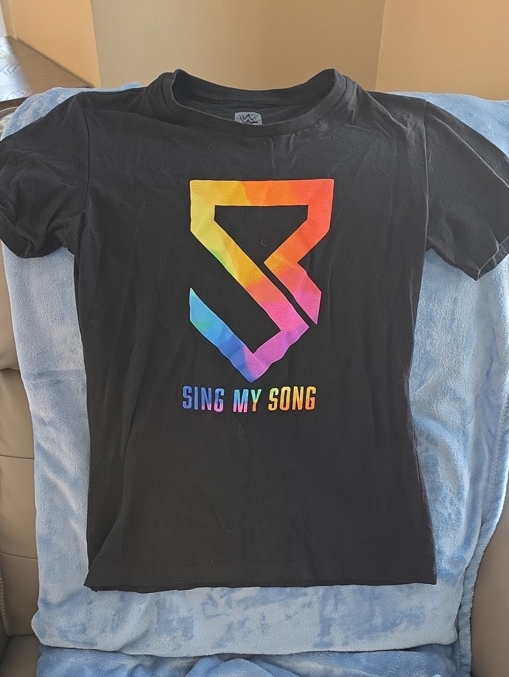 WWE Black Tee with Rainbow 'Sing My Song' Seth Rollins Logo